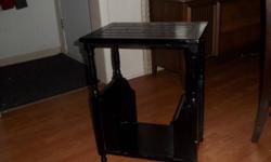 Dark wood magazine table, very little wear and tear, still in good condition.
           23.5 inch high
           18.0 inch large
           12.5 inch deep
 
If interested call 955-6671