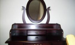 For Sale: Make -up table and Seat, good condition, paid 229.00(+tax), cherry wood, asking $125.00 O.B.O.
please email inquires