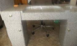 Manicure table, marble look with four plug electrical set up for lamp or other equipment.  Great for a beginner just starting out.  Two chairs, one leather with tall back and one short, swivel, material brown chair.  Please call 226-789-3834 if