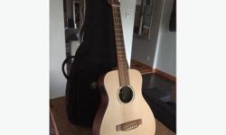 Travel guitar martin LXME with fisman pick up and carrying case. Great condition. Beautiful sound!