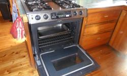 Beautiful stainless steel Maytag Insert Range.  Propane.  Excellent condition.  Very Clean.  Must sell.  We operate on solar system, ignitor rod for the oven takes too  much power from our system in a baking cycle.  Need to purchase a unit with pilot
