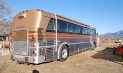 I have a MCI Bus conversion, 6V92 6 speed world Allison transmission,(new not rebuilt),
12,000KM (New tires) not recaps.  Beautiful oak interior with matching curtains and upholstery.  Large kitchen, living area and bathroom.  Rear walk around bed.  This