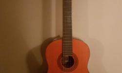 Medallion classical guitar made in Japan great beginner guitar or student model classical has a very good old tone and needs to find a new home call Glen at 250-532-5339 check out my other ads
