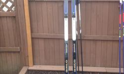 Men's cross country skis 195 and Salomon boots, size 9. Barely used, like new