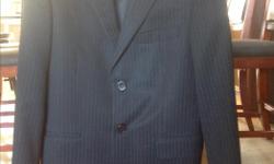 Black pinstrip. 38 regular. Excellent condition. Bought from Moores. A couple black buttons on cuff need replacing.