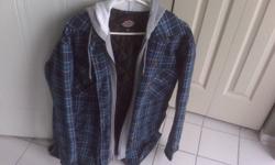 Blue and black mens plaid "Dickie" brand coat, size medium $35.00
Grey ski coat with removable fleece lining, size small $35.00