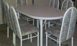 metal dining room table with 6 metal chairs for sale - table comes with removeable 12 inch insert lleaf - In very good condition with a couple of marks on the table and one of the chairs
table measures 60 inches log and 48 inches wide with leaf (48 inches