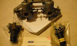 S.U. carbs for MGB. HS4 type tagged AUD52. with intake manifold. Also 2 S.U. fuel pumps. 1 factory rebuilt the other used. Includes Tuning tool kit. All in excellent shape. Asking $ 130 for all.