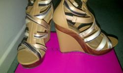 Color: Mini Tan
Size: 6.5"
Heel Size: 5"
(Never been used)