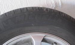 Michelin Harmony All Season Tires  on mags with lock nuts the size is 205 65 15 it was on a 2005 honda accord sedan 4 cyclinder $550.00 firm