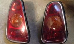 For sale, a complete set of OEM Mini Cooper rear lights. Will fit 2002 to 2005 models. $75.00 for the set Call Henry at 647-504-9476