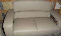 Couch and loveseat set, awesome style, beige in color. Has a few minor scratches from my cat which is why I need to get rid of them quickly. $800.00 obo Contact april at 403-877-9668