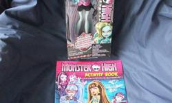 NEW IN BOX. PLUS bonus 2014 brand new book "Monster High Activity Book" Stickers Included". Great gift for collectors!
Lagoona Blue, daughter of the sea monster. From the 2013 Frights, Camera Action! Black Carpet Collection.
Ages 6+
Still Available if you
