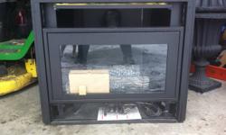 Montigo B34-DV Direct-Vented Propane Fireplace
 
A natural gas conversion can be purchased for this unit for approximately $100.00. Front louvers are readily available at EMCO for a minimal cost.
 
The B34-DV unit is rated at 16,000 BTU/H (4.8 kilowatts