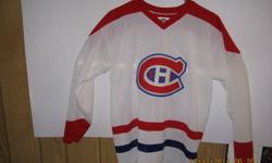 i have for sale a MONTREAL CANADIANS jersey-has LAFLEUR # 10 on back- it is in excellent condition and never worn-size is medium -made in canada--asking  (75.00)--aj.