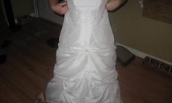 Beautiful Mori Lee Wedding dress for sale, has bead work in the mid section ,ruching on bottom and is strappless, paid over 1500 sell for 550 obo, call Ben at  705 380 0318 or email