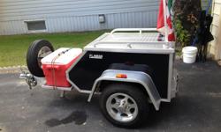 Aluma motorcycle trailer. Used very little. Excellent condition. 12" tires