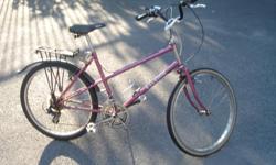 15 speed mountain-for a man or a woman-this bike is called Raleigh-rocky, it has a shimano derailleur, thumb shifters, high handle bars, alloy rims, quick release seat, steel pedals, it comes with a bell, carrier, bottle holder and fenders, good