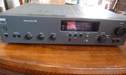 Hi, this is a great looking and sounding, quality built NAD 705 Stereo Receiver. It weighs over 14.5 pounds and puts out 40 watts of power per channel minimum. It has been cleaned inside and out, for static free full bodied sound, with only .03% total