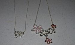 Selling necklaces for $3.00 each and earrings for $2.00 each.
