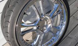 Brand new set of 18inch chrome rims with high performance summer tires. they are double 4 bolted, so it will fit most 4bolt patterns. I realise that summer is over, that is why i am offering them at less than what they would normally be. They were ment