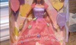 NEW Happy Birthday BARBIE (Mattel) w/ Tiara for you (2002)
* Happy Birthday Barbie Doll, Pretty Birthday Tiara For You! is a 2002 Mattel production.
* Includes: 11.5" Barbie Doll w/blond hair & blue eyes. Doll wears a dark pink Bow in her hair, a Gown