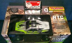 ***New in box***
Axial AX-10 Crawler RTC
-2.4 ghz radio and transmiter
-drag brake esc (castle link compatible)
-55T motor
-many upgrades available
Hotbodies charger and HPI plazma battery are included
just charge the battery and go.
**8 AA required for