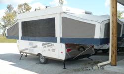 NEW 2011 JAYCO JAY SERIES 1207 TENT TRAILER - 2 YEAR FACTORY WARRANTY.  BUY NOW - NO PAYMENTS TILL SPRING. Lists for $11,975.00.  Loaded.  2 cu ft. 3 way fridge, Patio Awning, 2 bunk end lights with fans, water purifier, 2 heated bed mats, 2nd table