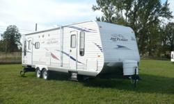 NEW 2011 26RLS Jay Flight Travel Trailer.  2 YEAR FACTORY WARRANTY. BUY NOW - NO PAYMENTS TILL SPRING.  Lists for $26,608.00 .  Great floor plan for two.  Rear Living room with 2 swivel rockers, Extended dinette with mobile seat/storage, Interior height