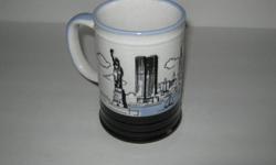 NEVER USED * GOOD CONDITION
THIS MUG HAS THE TWIN TOWERS
ON IT PLUS OTHER SITES OF NEW YORK