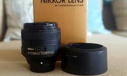 In mint condition. Optically sharp as a tack. Made for Nikon full frame cameras. Original packaging included.