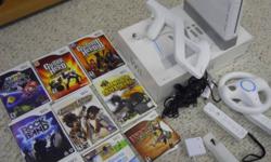 Selling Wii with all orginal packaging; hardly used.
Everything mint condition
 
Includes:
2 Wii remotes + 1 cover
2 Wii "numchucks"
Crossbow acessory
Racing wheel acessory
Rockband USB port + microphone + 1 rockband guitar+ drumset
2 guitar hero guitars