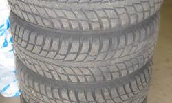 Four excellent condition snow tires and rims.  Used for one season.  Came off a Volvo sedan which was sold. Tires are 205/60r15 and rims are 5 lug 108mm bolt pattern 15 inch