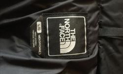 Size large, black North Face down vest. In excellent condition. Only worn a few times. I am selling it because it just doesn't suit me.