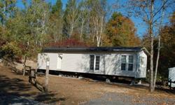 12x48 - Northlander Park Model Home - on rental lot at Loon Lake, Quin-Mo-Lac Rd, 3 kms south of Madoc, immaculate Park.  Many extras - central vac, hardwood floors, carpet bedrm, washer/dryer stackable, dishwasher, side by side fridge/freezer with ice