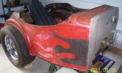 1932 Austin Bantam fiberglass drag car body from the late 50's through the 60's , that wreaks of history , with a vintage Model A chassis , it is only in the early stages of mock up . It is a rare project that comes with many of the nostalgia pieces to