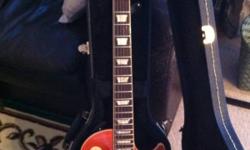 ABSOLUTELY MINT !! Les Paul Standard with 50's rounded neck. Never gigged and in perfect condition. Fantastic action and tone. Sustain for days. Weight relieved body. Looking to sell or trade for Les Paul Standard with 60's profile neck. Thanks for