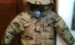 Great Condition, id say its an army green camo colour coat, its a really nice colour. very warm its fleece lined inside. Its a size 4t but my son wore from age 2 (I rolled the sleeves under) he is 3 and it fits nicely with mitts. Only selling because He