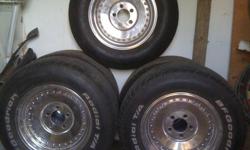 245 60 15's  295 50 15's....new rubber, just polished up...chev 5 bolt...camaro's, t/a's ,chickens,s-10's,monte's,etc.