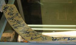 old timer hockey stick signed by old leaf eg. Sid Smith , Eddy Slack, Brett Selpy with authentic centre ice tape certificate. text me or email at 289-228-3520 or email if interested.
