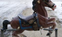 What a unique gift for Christmas! Original old fashioned riding horse in fabulous shape. Don't make them like this anymore! Bounces, rocks and is very sturdy!
