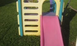Outdoor play structure stands about 3.5 feet tall. slide can be added or removed. Easily take apart for transportation and easy to put back together.