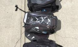 Several Oxford Luggage tank bags and a smaller tail pack. Prices are $30 to $40
