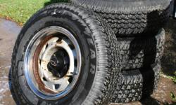 P225/75R15 Tires Mounted.
Four P225/75R15 Tires mounted on wheels off an 1996 Chevy S-10.
Two of the tires are ?Goodyear Wrangler RT/S?, and the other two are ?Signet Winter Trax?. All four tires have decent and even tread.
The wheels all come with chrome