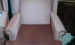 Pair of pink wingback chairs. In excellent condition for their age with only a few spots of discoloration or wear on the material. Very comfortable. Chairs are presently in Morrisburg, but can be picked up there or in Vernon. Delivery is also possible.