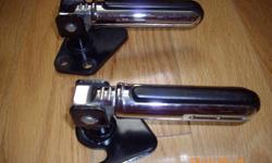 CUSTOM after market foot pegs off of a 2001 Yamaha VStar.  Mounting bracket, bolts and chrome/rubber pegs as shown.  $50. OBO.