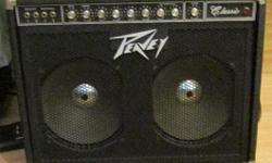 Rare Vintage 1974 Peavey Classic 212 , 2 channels , each with high and low input, one with bright boost, 1 normal, master volume, reverb and tremolo 2 X12 inch speakers and original cover, 2 6l6GC's output tubes for 50 watts tube power, this is a "hybrid"