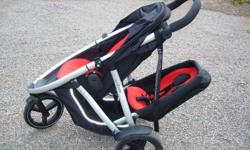 This stroller is fantastic!  Goes through any door (except maybe a linen closet).
This stroller was a lifesaver, enabling me to go places with my twins that I couldn't with other double strollers.  It has a long strap that can go on your wrist so the