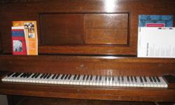 Antique Player piano. player portion does not work, still in good condition, piano is very heavy and can not be taken apart for moving, purchaser will need to move piano.