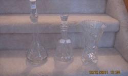 Pin Wheel Crystal
3 Items to pick from.
All in great shape, no chips.
1 - Decanter  -  13" high.
1 - Decanter  -  10" high.
1 - Vase  -  8" high x 5" wide.
Price:     $28.00 EACH.
Phone:   403-887-2811